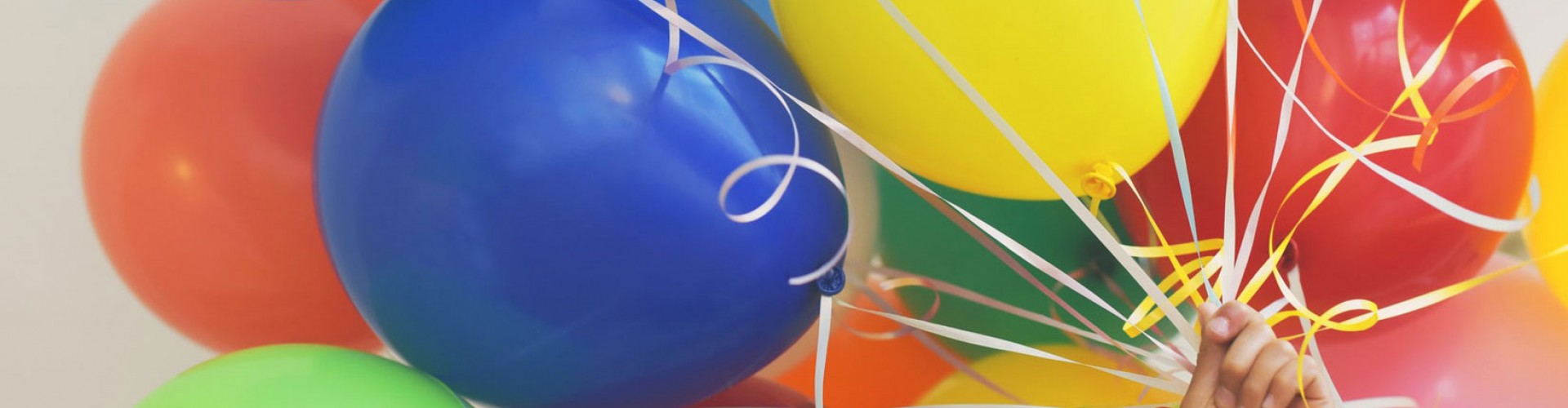 bunch of colourful balloons|Happy person