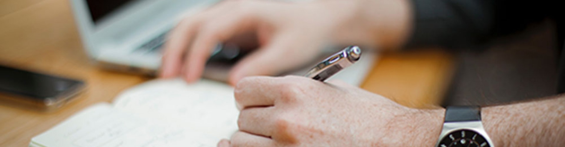 writing in a notebook