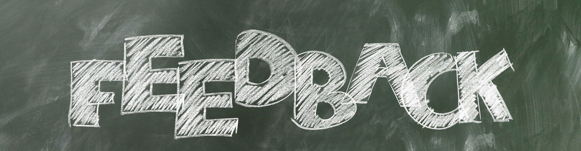 feedback written on a chalk board