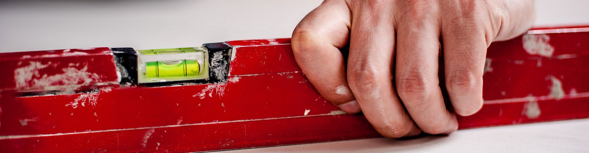 red spirit level being used 