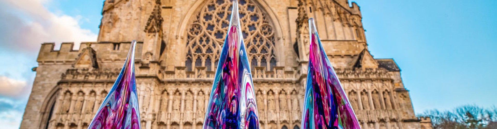 Exeter cathedral with 3 glass awards 