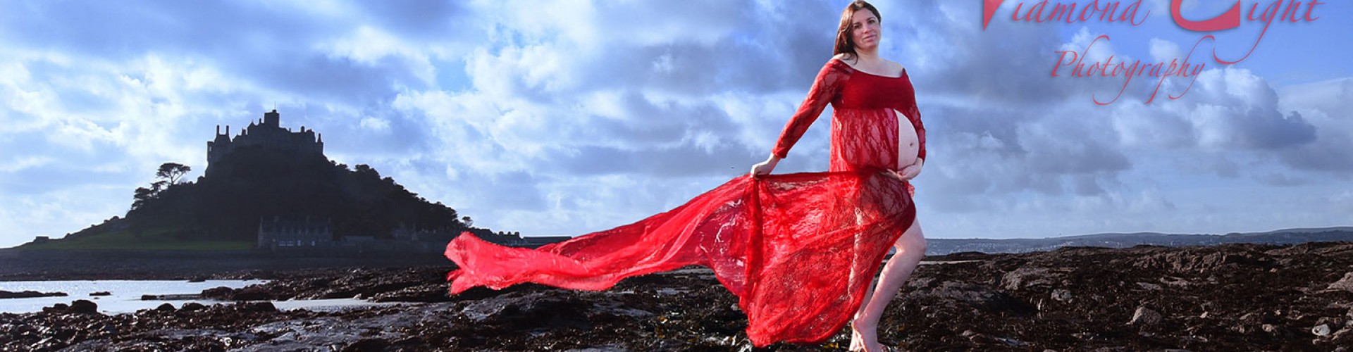 pregnant woman in red dress cornish beach art shot