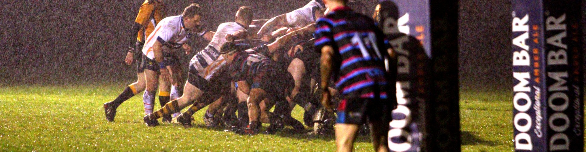 rugby scrum in the rain