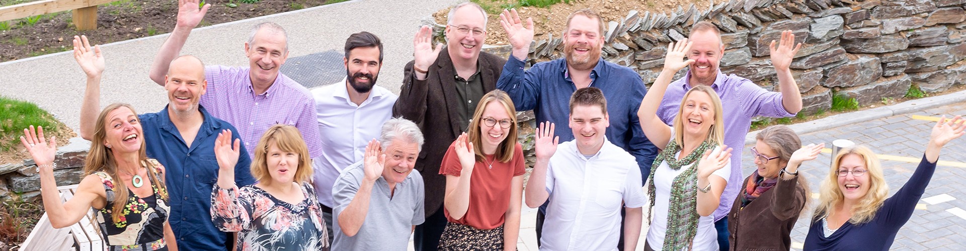 Growth Hub Team waving 