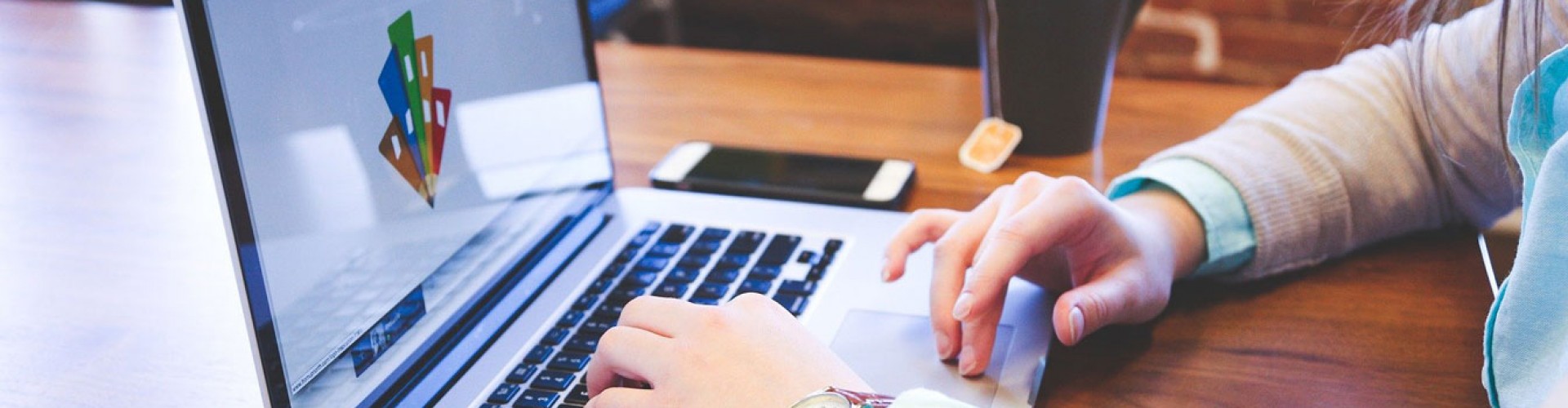 young woman working at laptop