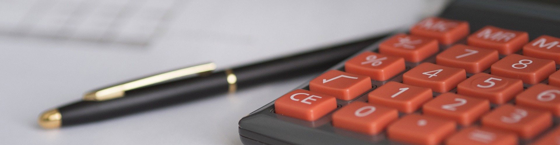 calculator and pen closeup