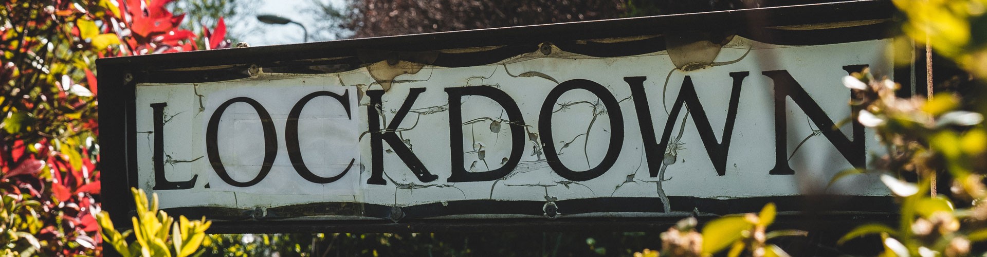 british street sign changed to say lockdown