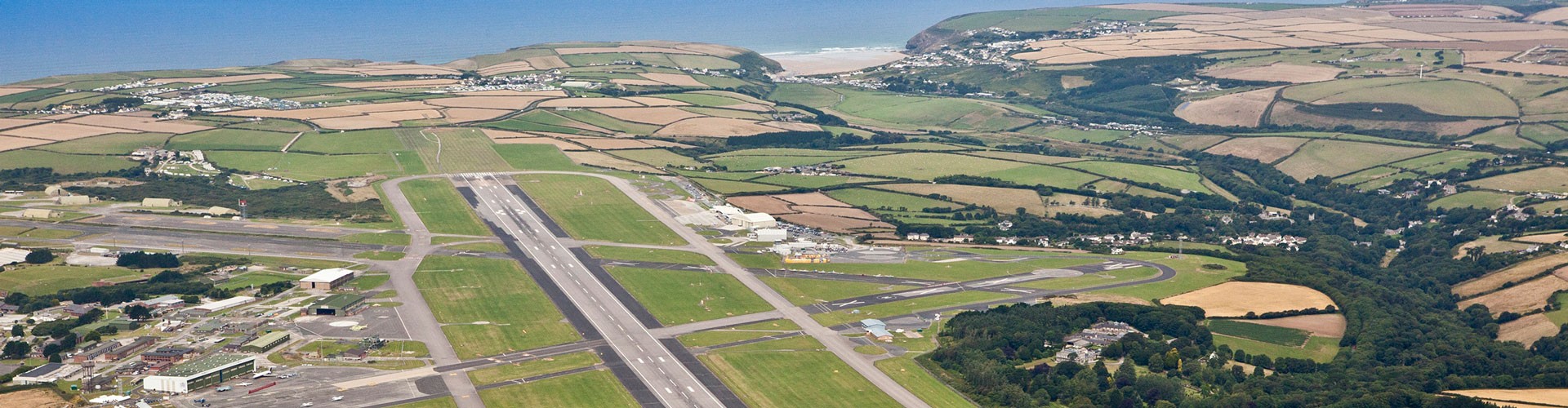 runway at Cornwall airport with sea in background