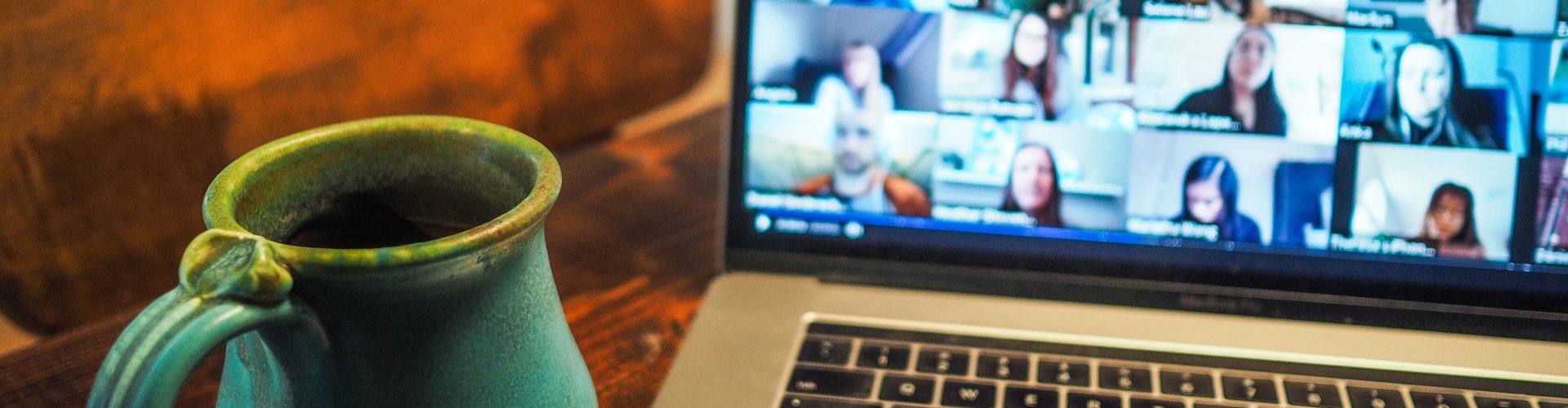 online meeting with mug of coffee