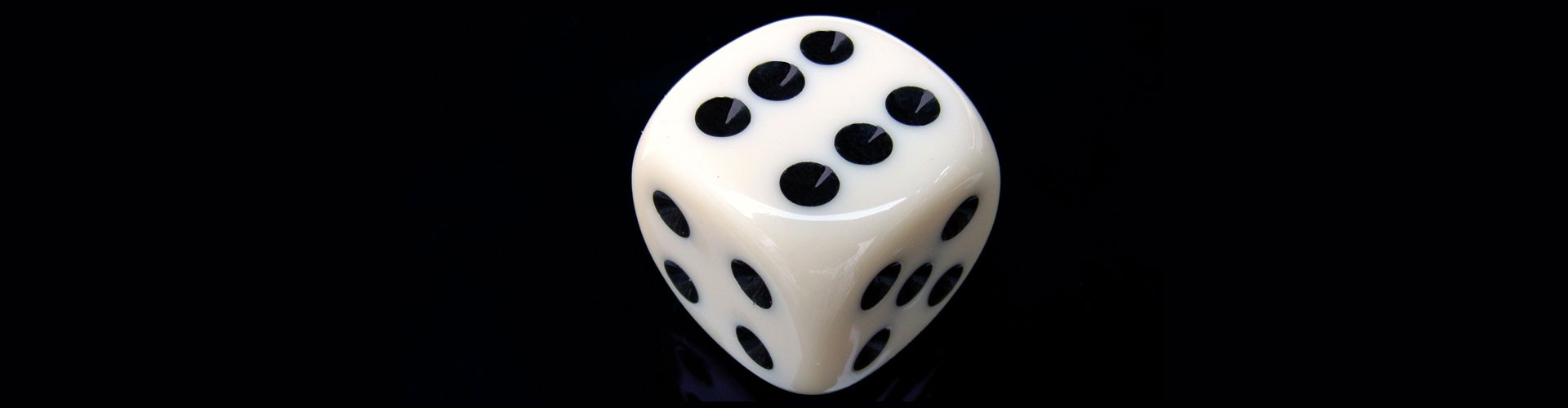 white die showing six on a black background