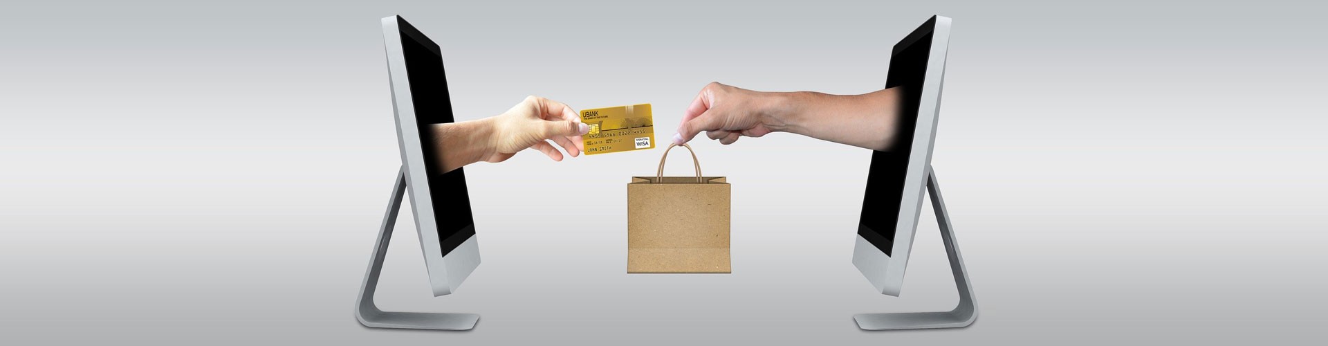 hands emerging from computer screens to exchange goods for payment