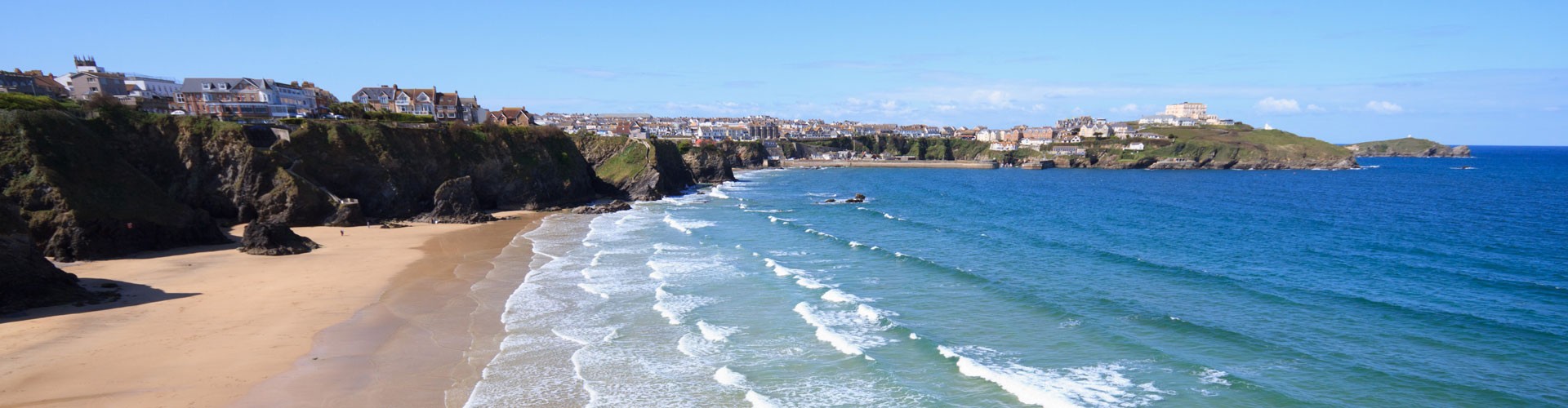 beach at newquay with town in background
