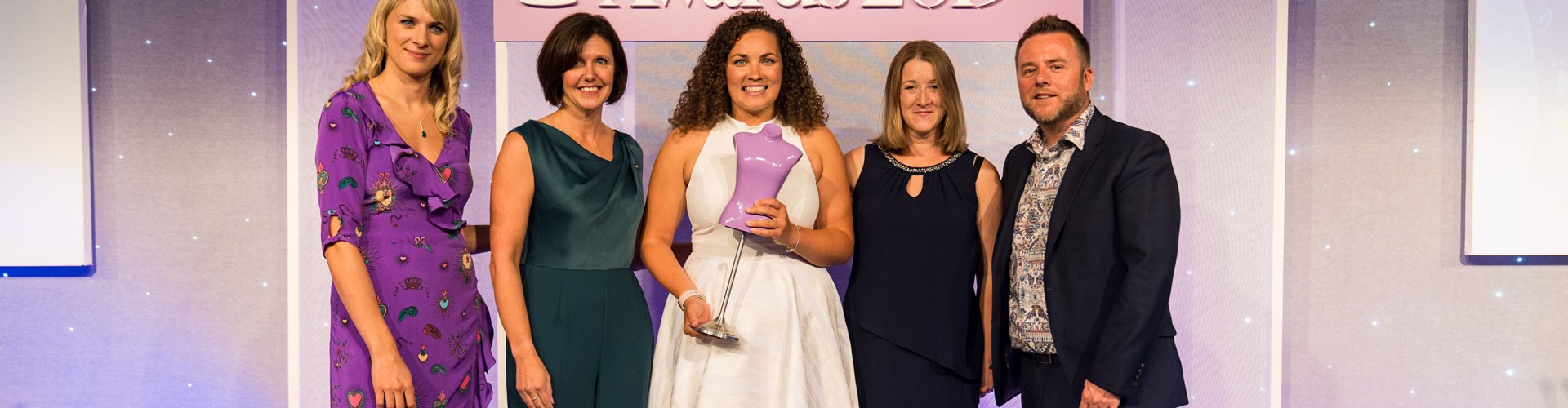 Mish team at accepting Drapers award