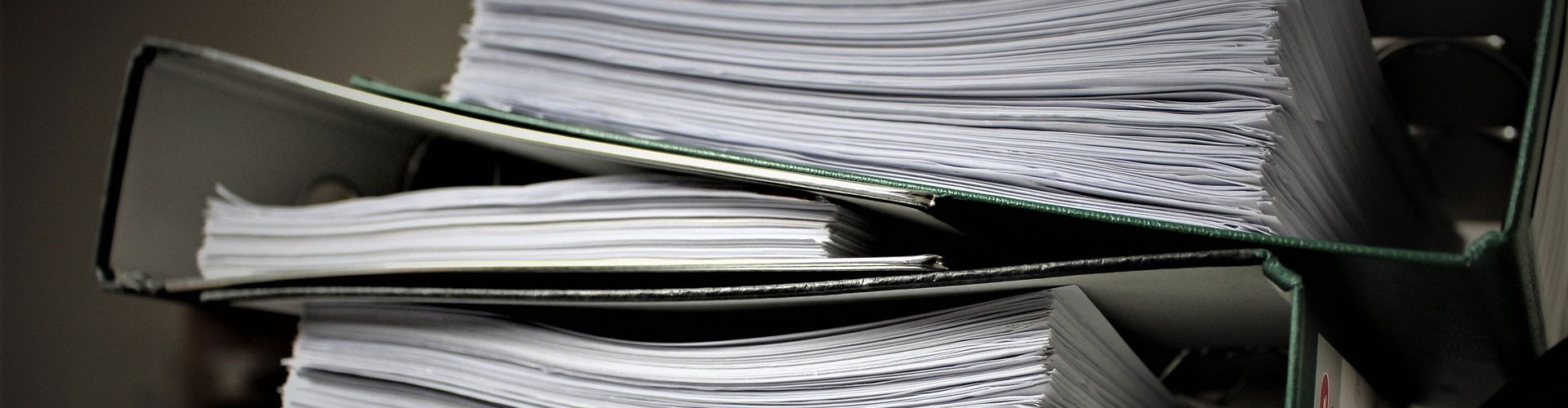 pile of lever arch files