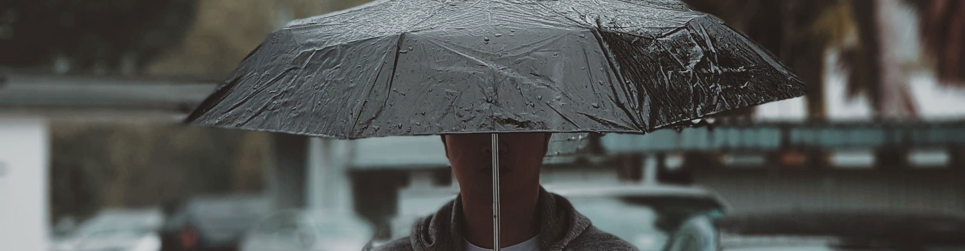 man under umbrella