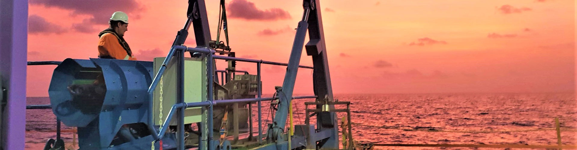 Feritech Global machinery at sea with sunset