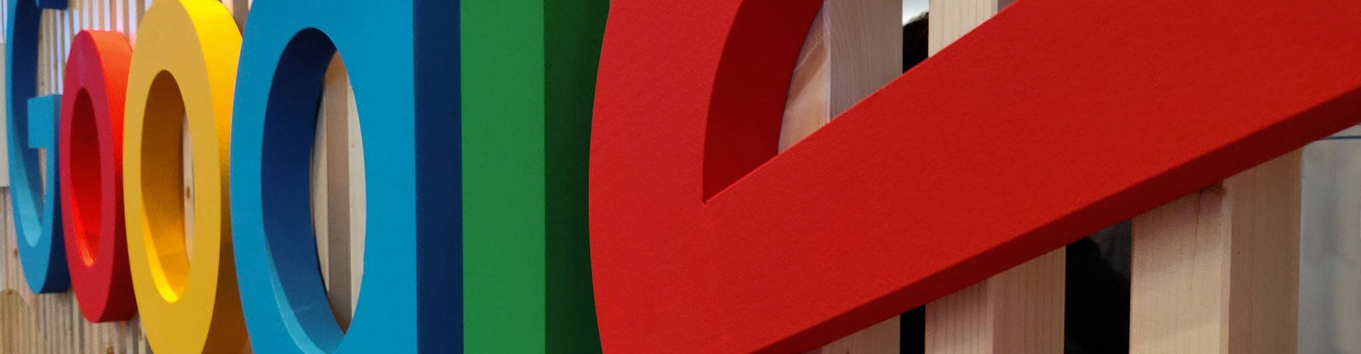 close up perspective distorted google 3D sign