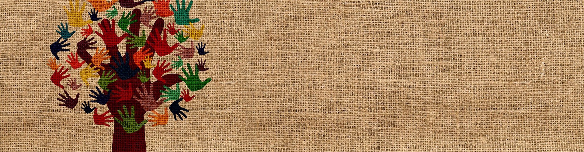 hand prints on hessian making the shape of a tree