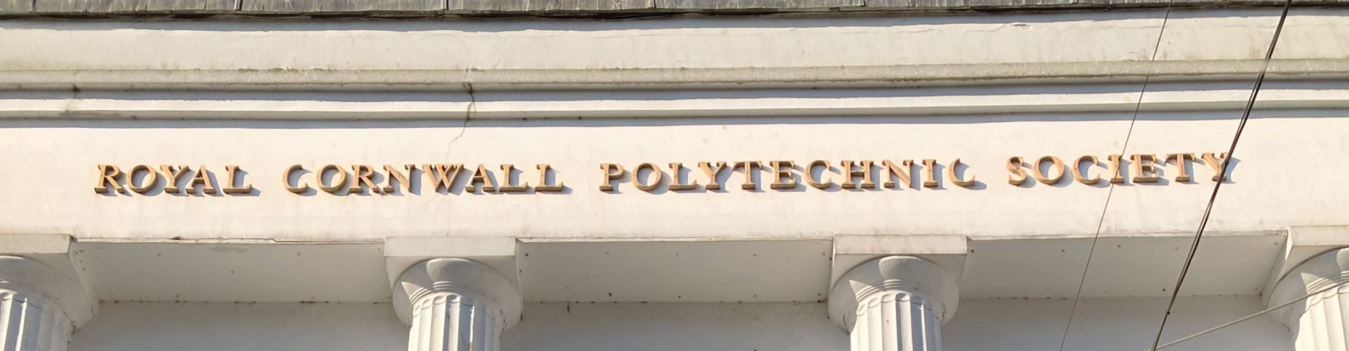 The Poly Falmouth sign