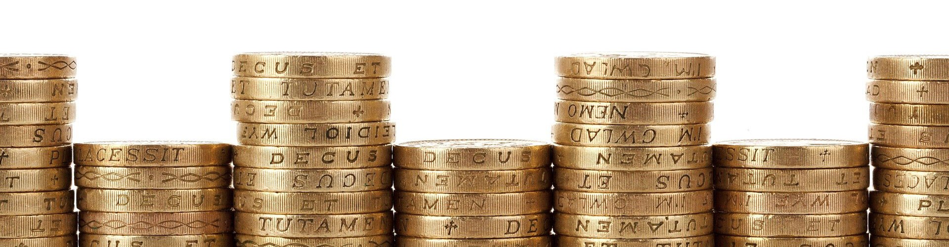 uk pound coins in piles