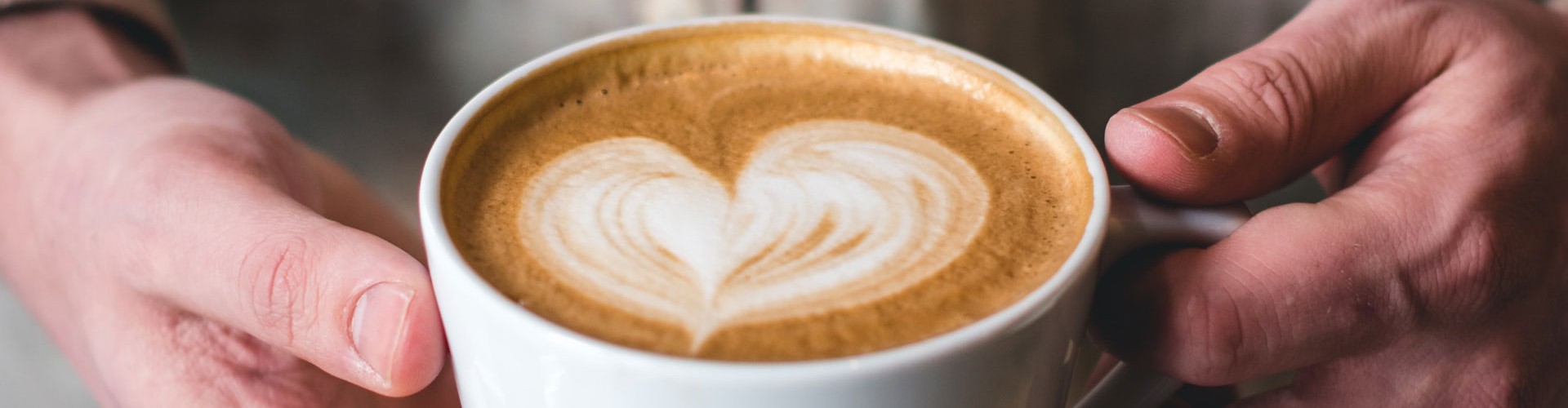 heart in coffee froth