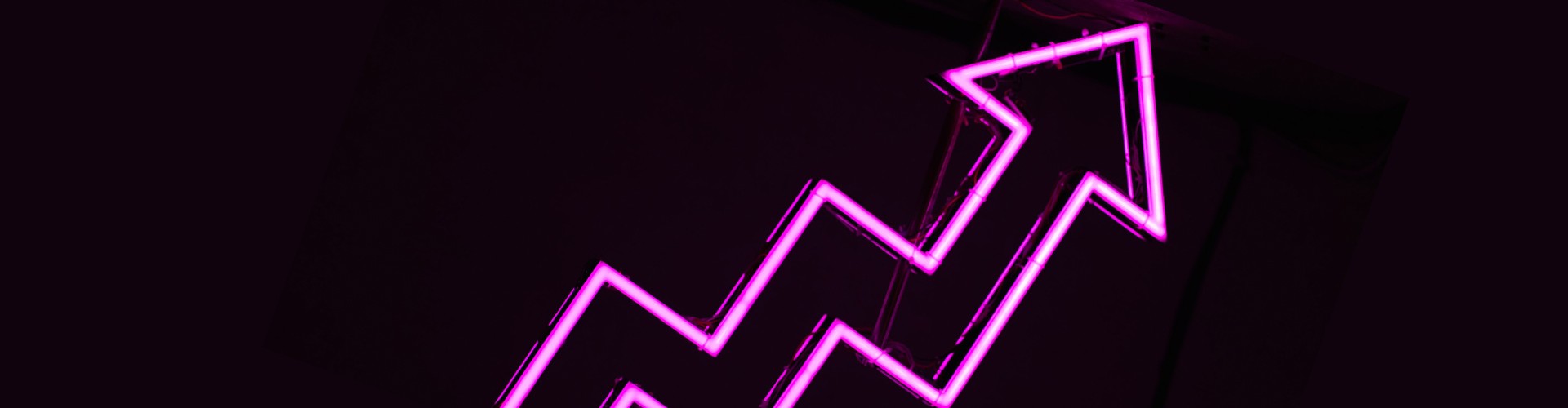 neon pink arrow going up