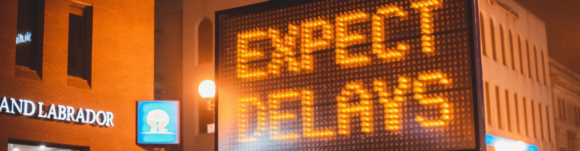 expect delays road sign