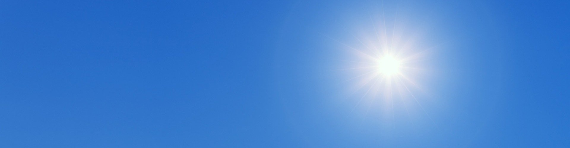 hot sun in blue sky