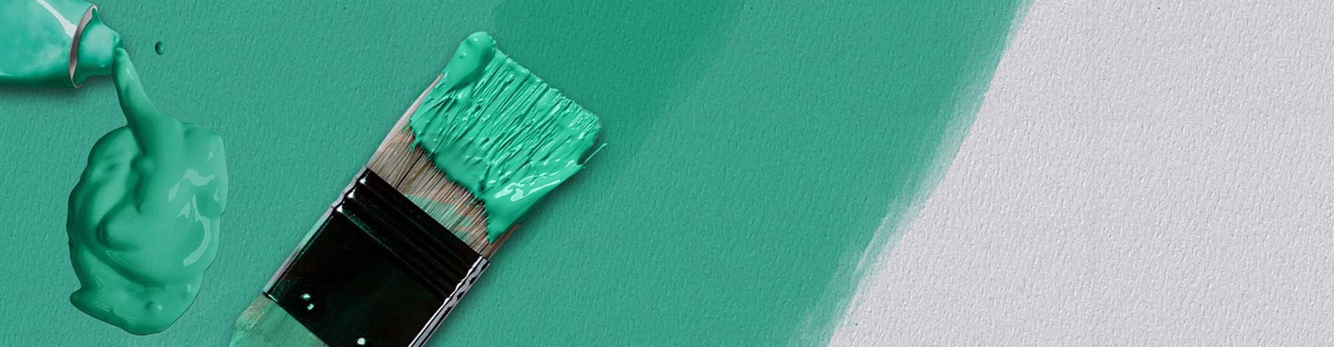 green paint and paintbrush