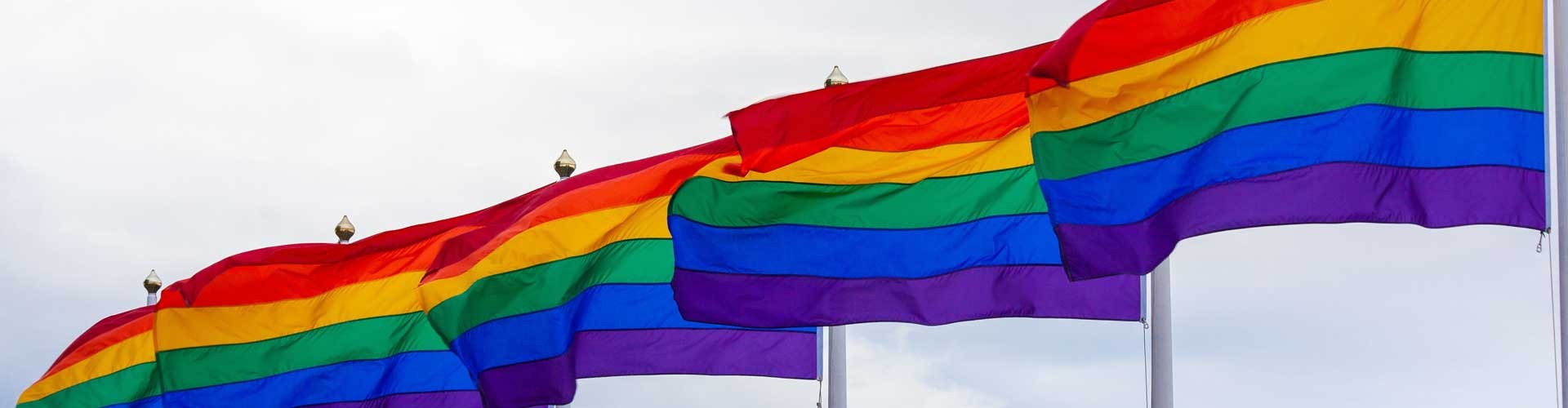 rainbow flags in the wind
