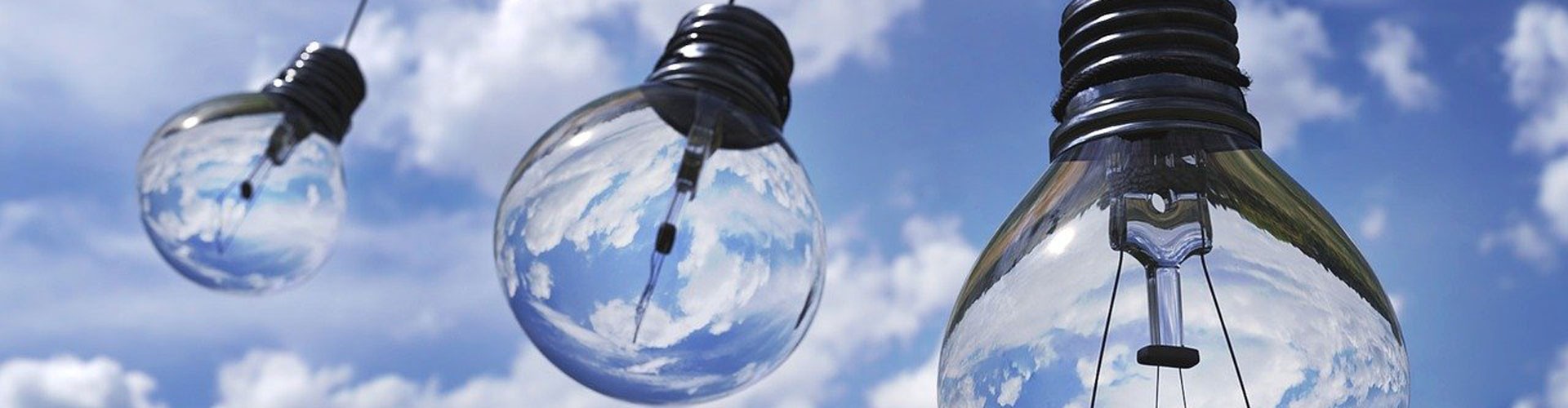 light bulb against blue sky