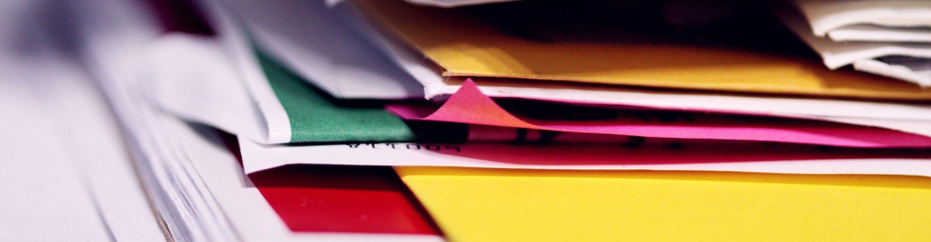 A stack of colourful files