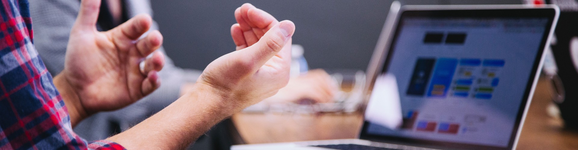 Hands and a laptop