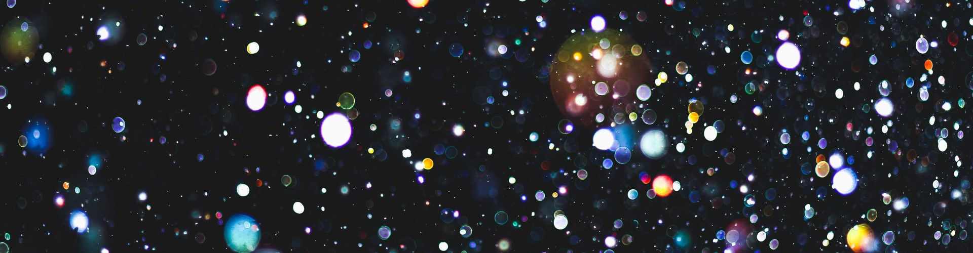 Glitter against a black background