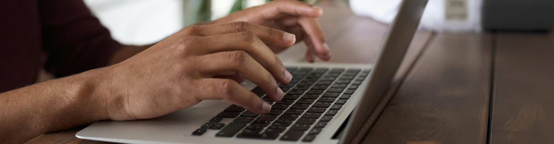 Man typing on a keyboard
