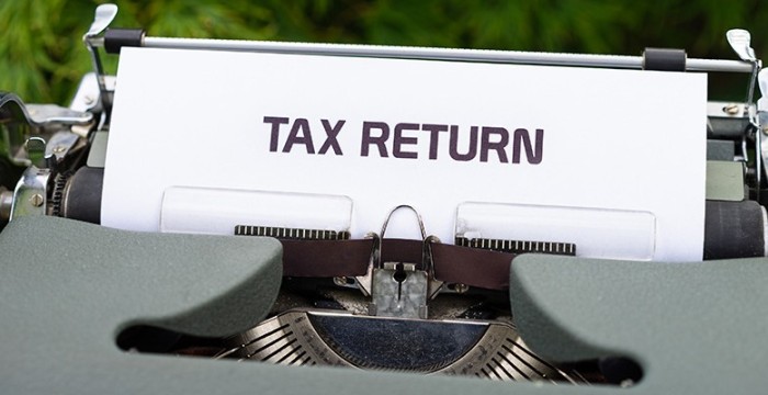tax return on typewriter