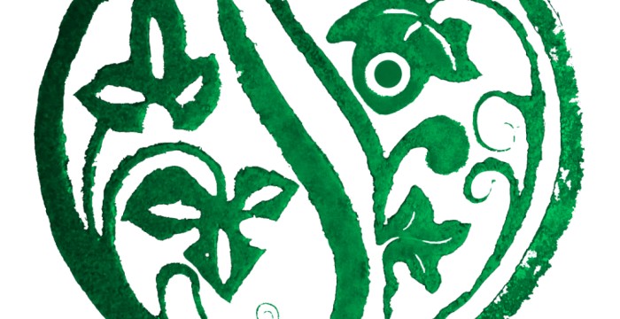 A circular design in green using the S and L of my initials 4 ivy leaves and 4 spots (4 for the 4 members of my family)