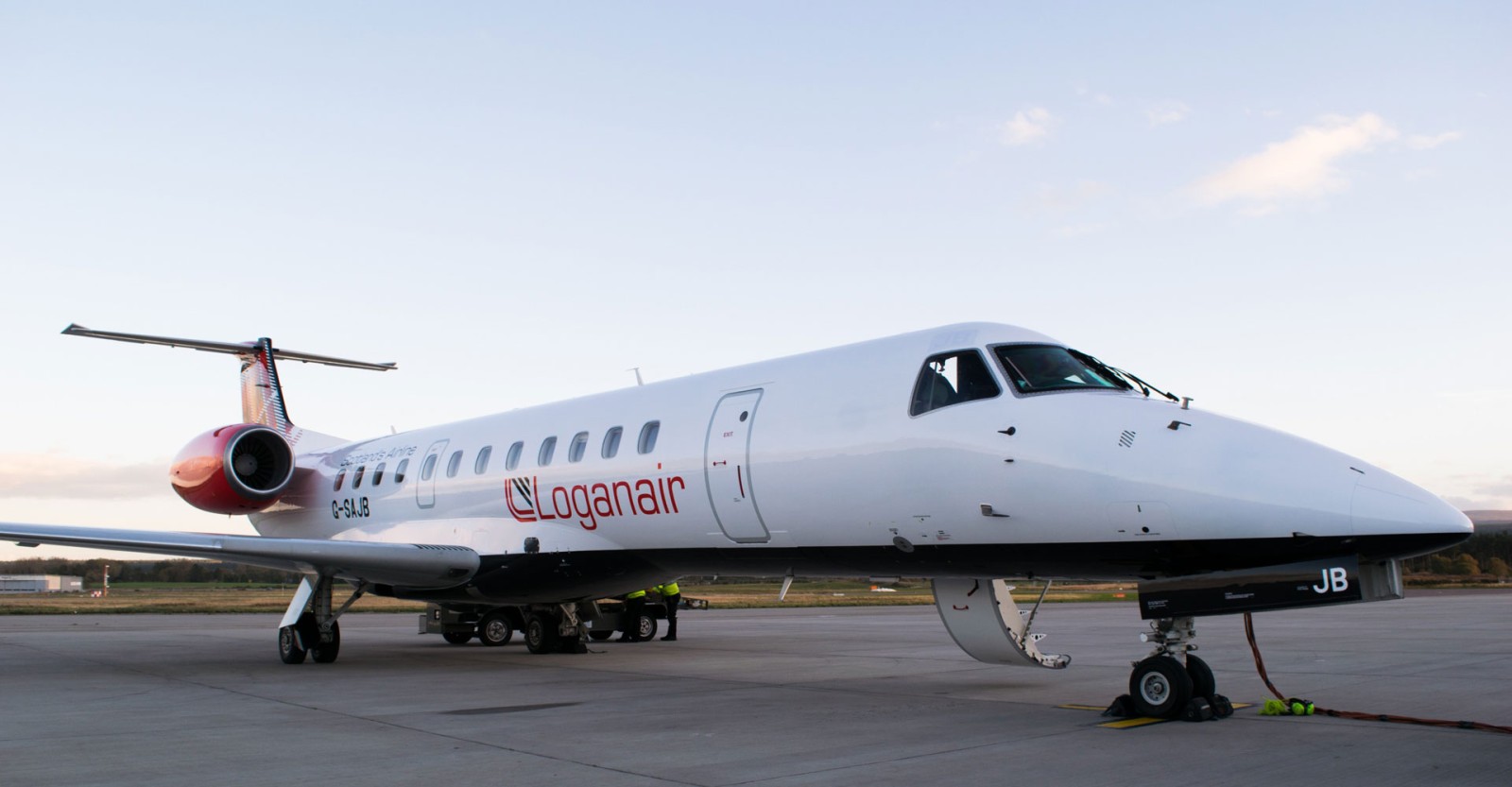 Logan air plane on the tarmac