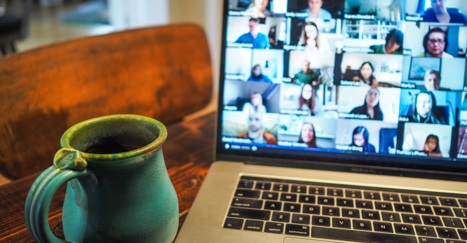 online meeting with mug of coffee