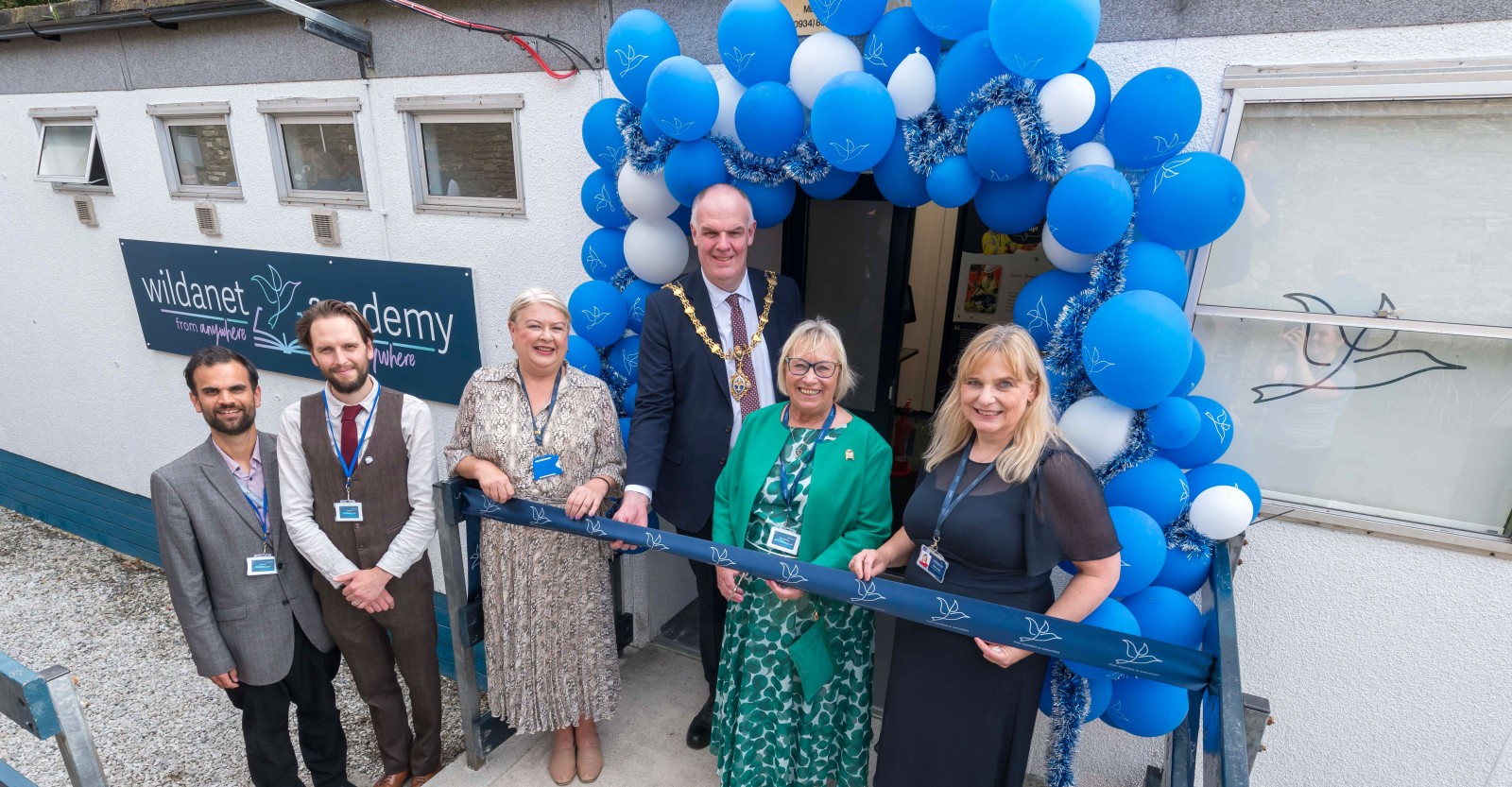 The Wildanet Technical Training Academy is officially opened by South East Cornwall MP Sheryll Murray, watched by Julie-anne Sunderland, Chief People Officer for Wildanet; Mayor of Liskeard Cllr Simon Cassidy; Helen Wylde, Wildanet CEO; and representatives of Truro and Penwith College.
