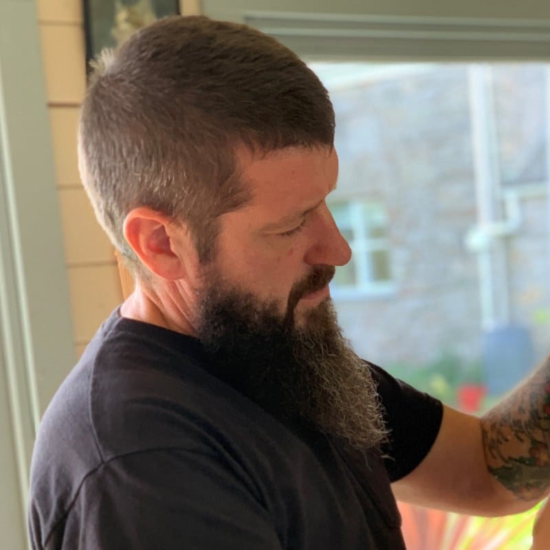 Barber cutting a man's hair
