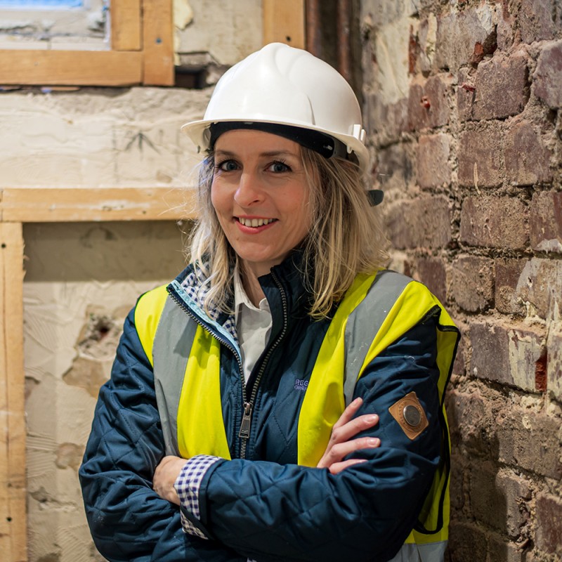 Chloe with hi vis and hard hat